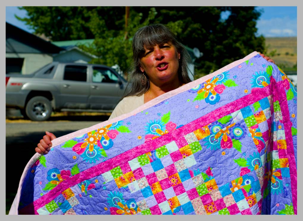 CLIFF CREGO | Friend, SHARON CHAMBERLIN, with one her beautiful hand-made quilts